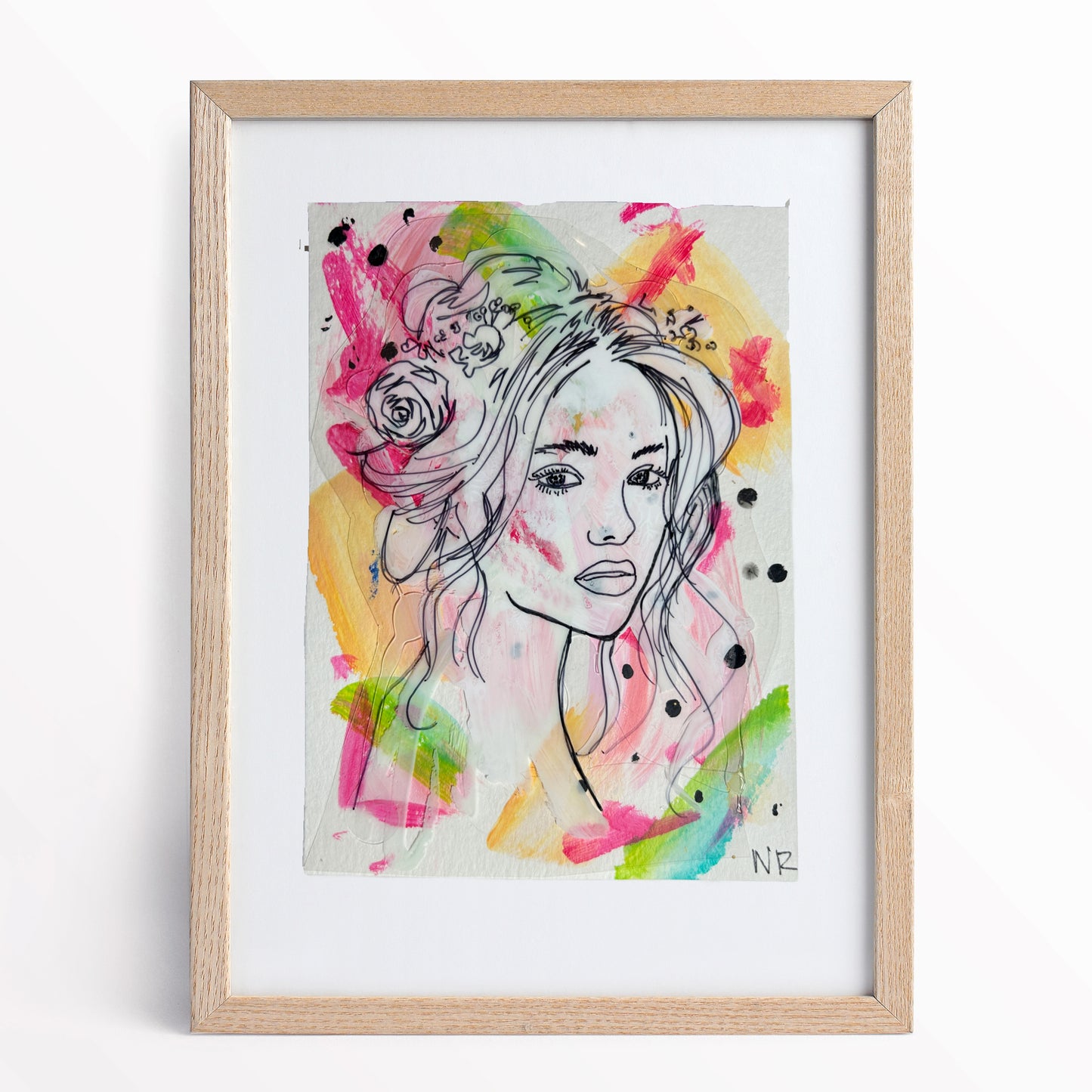5x7 inch Goddess Sketch by Natalie Russo, framed in a natural wood frame. The artwork features a black line drawing of a goddess surrounded by colorful abstract strokes, ready for display.